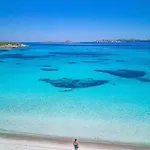 Residenze L'isola Surf House アパートホテル 4*