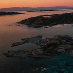 アパートホテル Residenze L'isola Surf House ポルト・ポッロ