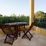 Residenze L'isola Surf House アパートホテル ポルト・ポッロ