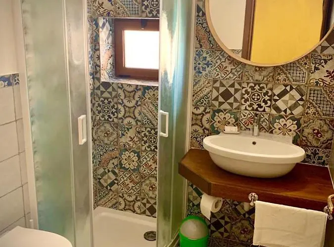 Residenze L'isola Surf House Апарт-отель Порто-Полло
