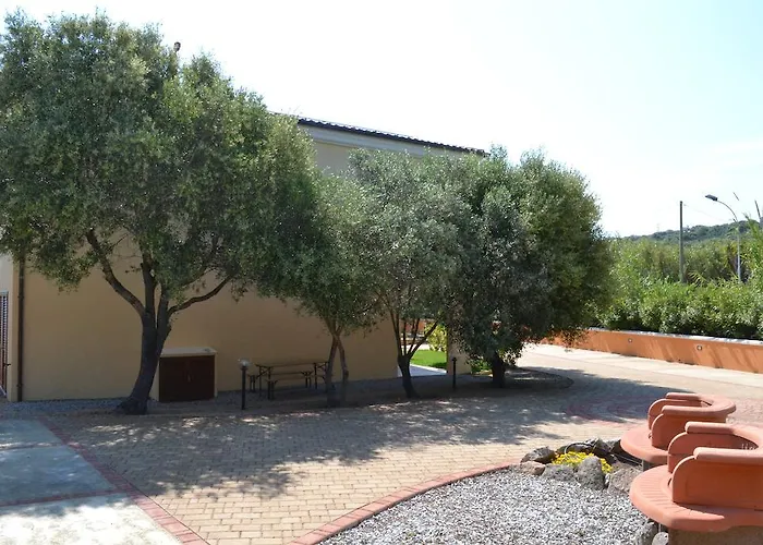 Апарт-отель Residenze L'isola Surf House Порто-Полло